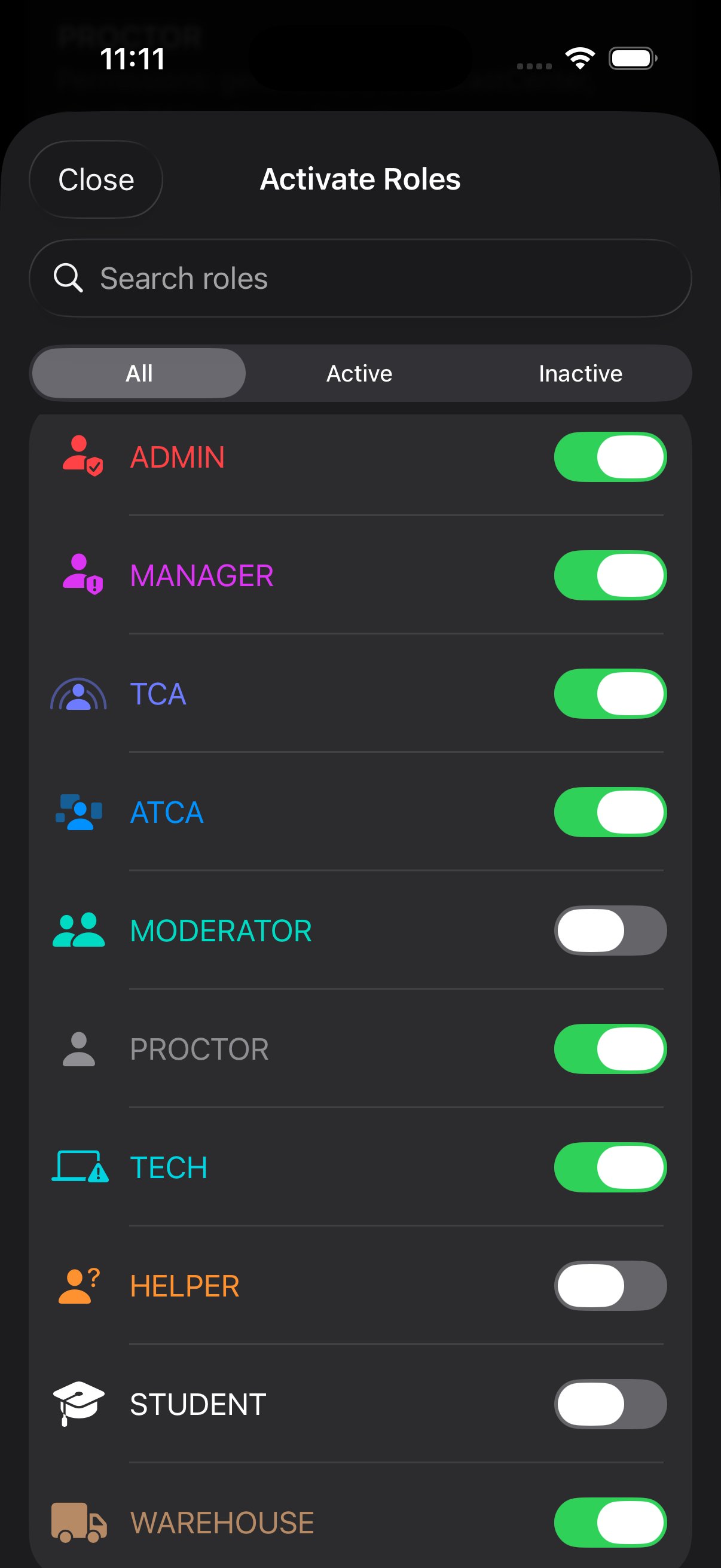 Activate Roles modal, All tab, showing 10 roles each with a toggle: ADMIN, MANAGER, TCA, ATCA, MODERATOR (off), PROCTOR, TECH, HELPER (off), STUDENT (off), WAREHOUSE